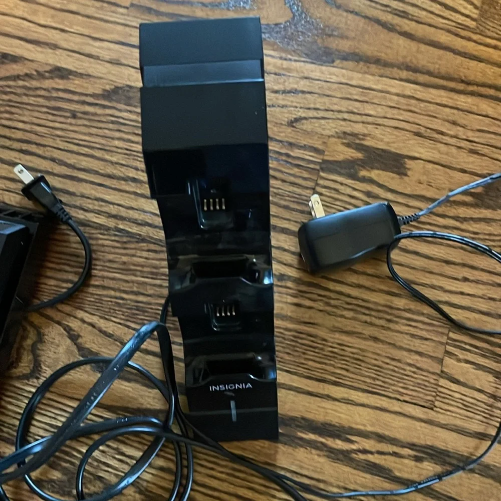 PS4 Console with dual controllers, controller charging station with 16 PS4 games